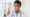 A male doctor smiling and giving a thumbs up, promoting the dos and don'ts of cataract care