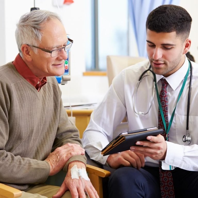 . A doctor discusses glaucoma with a patient in a hospital room, surrounded by medical equipment and a calming environment.